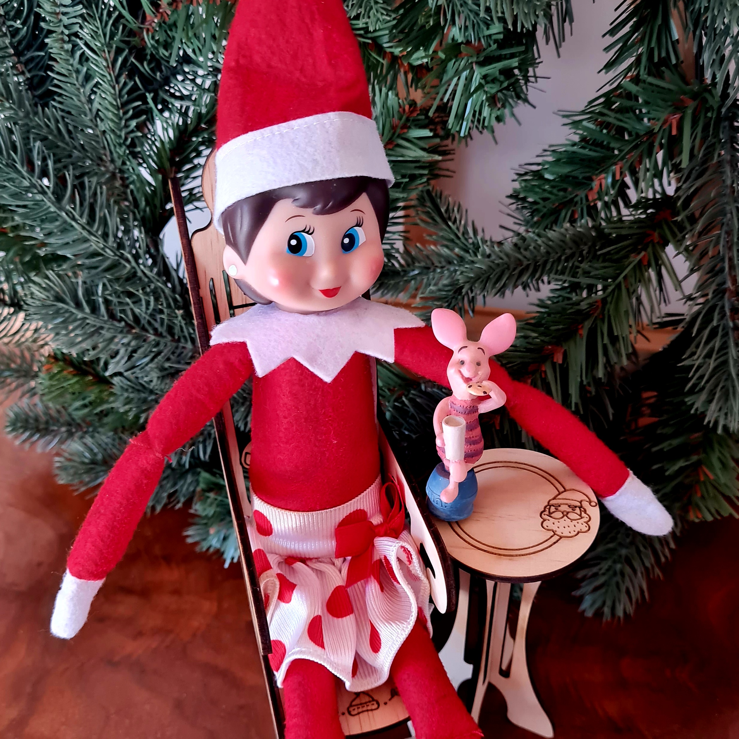 Elf in rocking chair with table